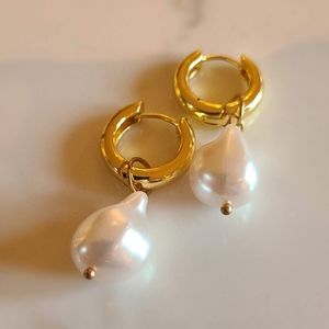 Pearl shaped gold toned earrings